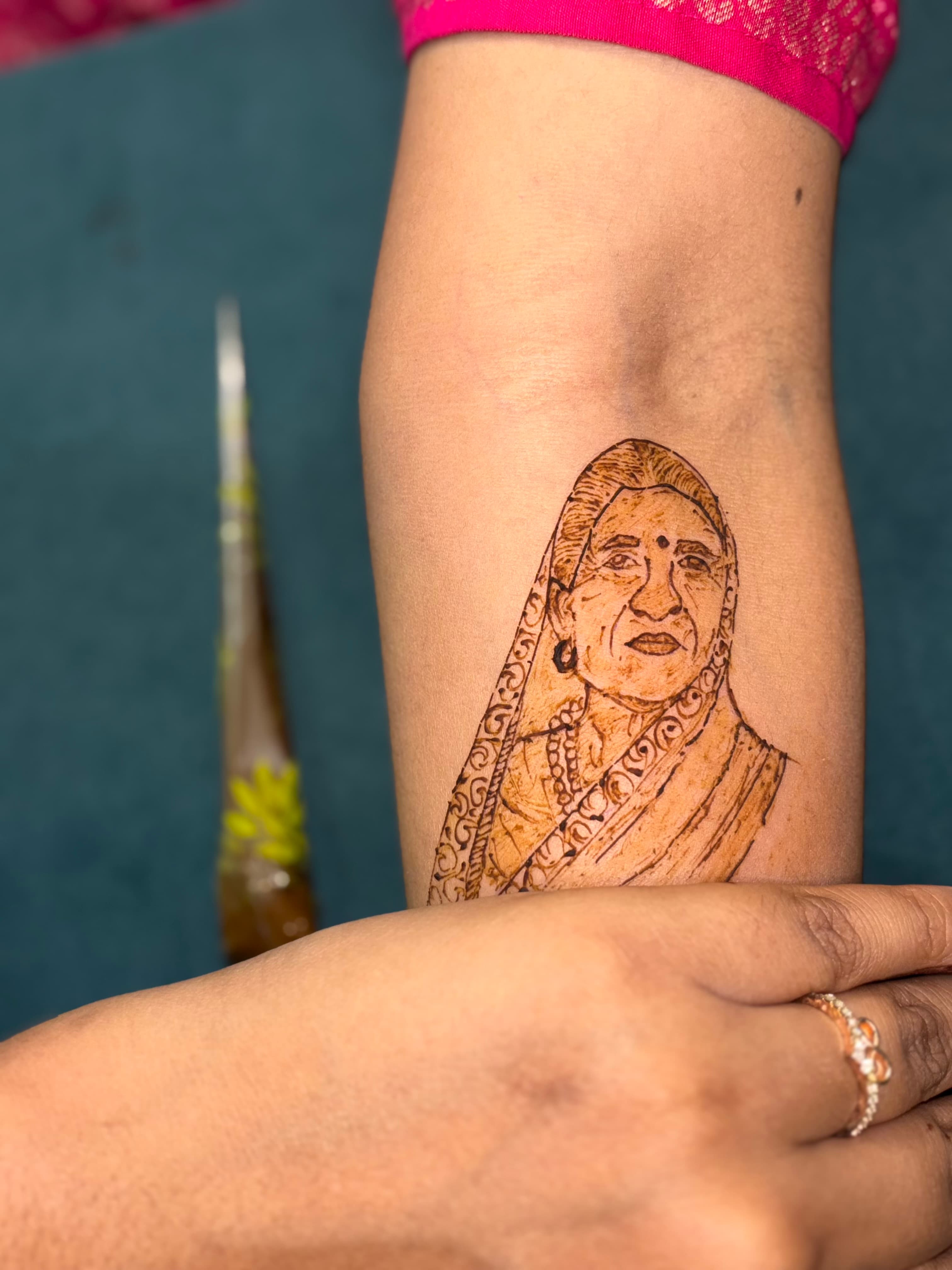 Customized mother portrait bridal mehendi design by Royal Hands By Dhanashree